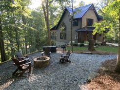 Modern/rustic chalet nestled in the woods at Paradise Ranch & Retreat