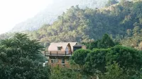 Song Hua Ju - con vista montagne