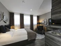 แอร์พอร์ตโฮเทล เบอร์ลิน อาดแลร์สโฮฟ โรงแรมในเบอร์ลิน