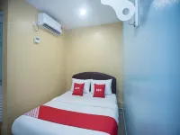 Hotel O Rafik Ali Motel فنادق في Penaga