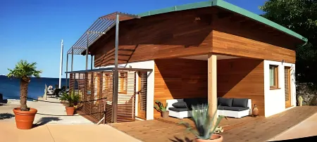 Tre Merli Beach Hotel Отели в г. Grignano