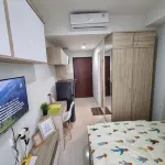 Tentrem Room at Springwood Residence Hotel in zona Surya University Campus Hub