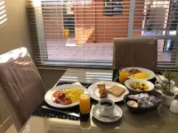 시티 로지 부티크 호텔 Omuthiya 호텔