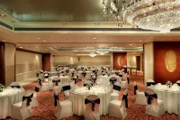 Mahagun Sarovar Portico Suites