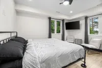 Luxury Waterfront Retreat with Sauna, EV Charger, Pizza Oven & Lake Views