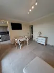 Apartment with balcony upstairs of a villa 300 m from the sea