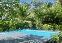 BEACH FRONT HOUSE 50mts from the water. PUNTA UVA ARRECIFE - piscina