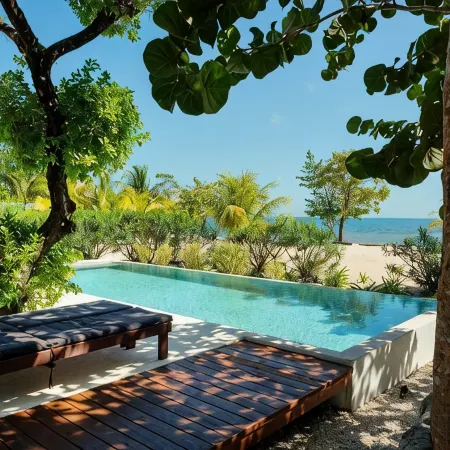 Oceanfront 4 Bedroom Bungalow with Private Pool, Large Beach Area and Staff