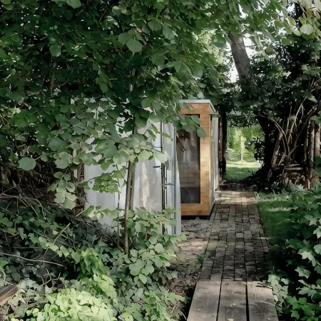 REMISE ground floor: Garden apartment with wood-burning stove, terrace and water access