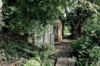REMISE ground floor: Garden apartment with wood-burning stove, terrace and water access - 레지던스