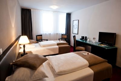 スーペリアツインルーム ザ コーナー ホテル フランクフルトの写真