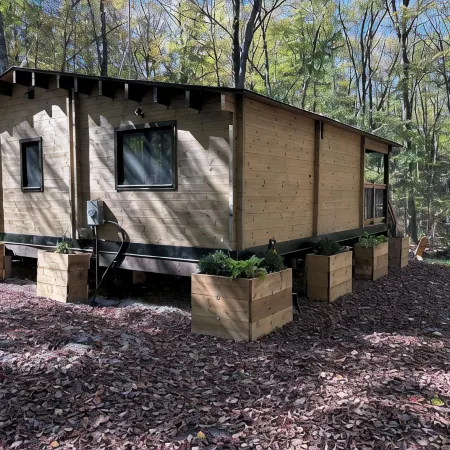 Riverside cabin in the woods