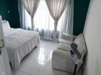 A Cozy Selfcatering Apartment, 5Min dr to the Center and 7Mins to the Rainforest