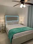 Palms Villa - Newly renovated condo by the beach! - balcony