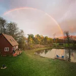 Home with a spring-fed pond and mountain view. - Boutique