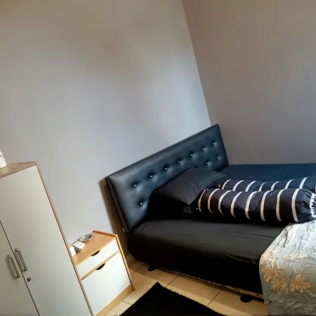Apatel Ecohome Citra Raya by Santi Room Hotels in Panongan