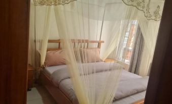 Room in Guest Room - Charming Room in Kayove, Rwanda - Your Perfect Getaway