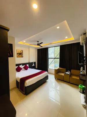 The Porch Inn Hotel/Service Apartments Отели рядом с достопримечательностью «Лалба Ботаникал Гарден»