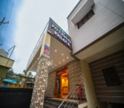 The Pothigai Palace Hotels near Old Coutralam Falls