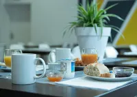尼姆中心舒適公寓酒店 - 早餐