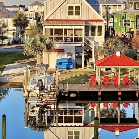 Waterfront; Golf Cart option; hot tub; Kayaks; Peddle Boat; Walk to beach; Ramp