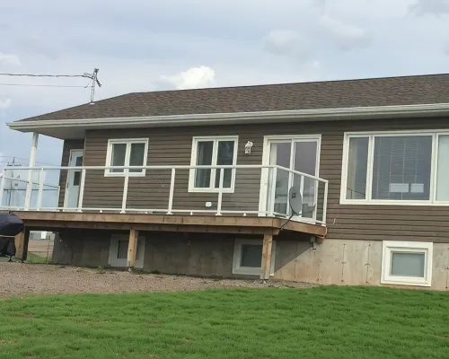 Main Floor (Unit 1) in House, Deck, Sunset, Water View (Cheticamp Harbour) Hotels in Chéticamp