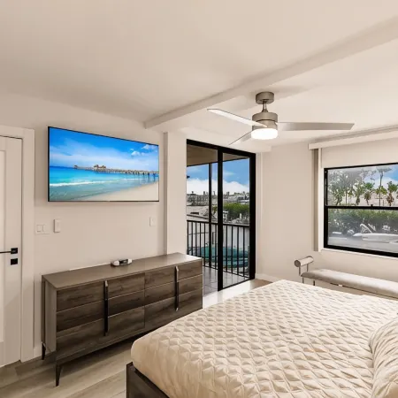 Vanderbilt Beach Condo, Bay Views, New Saltwater Pool, Walk to Beach