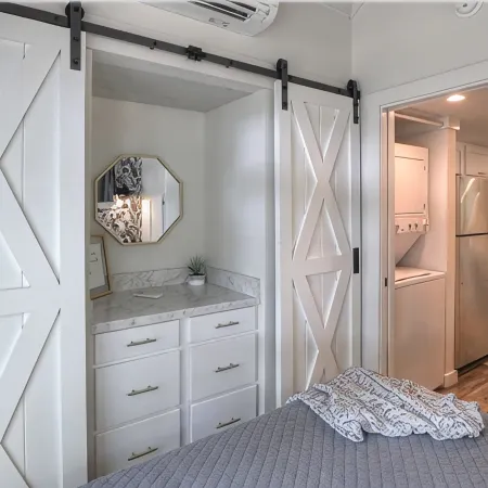 Nesthaven: A cozy boho-chic tiny home with a deck, fire pit, & nearby waterfall