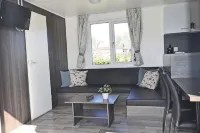 Chalet Florence 5 , 6- Persoons met Veel Privacy; Huisdiervrij,ruime Tuin - 2 ดาว