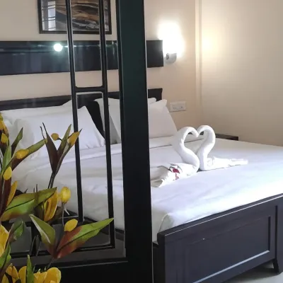 Orison Residency Hotel Hotels near St. George Church Mangad
