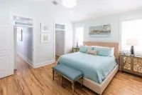 Charming Beach Retreat with Golf Cart and Access to Pools - Inviting Oasis Hotels in Sunnyside