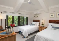 A beautifully renovated Caribbean Villa fronting a private seaside cove.