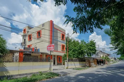 RedDoorz Near Millenium Waterpark Palu Hotel a Talise