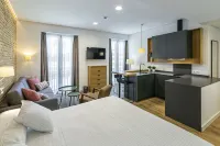 Aquitania Home Suites - Apartments