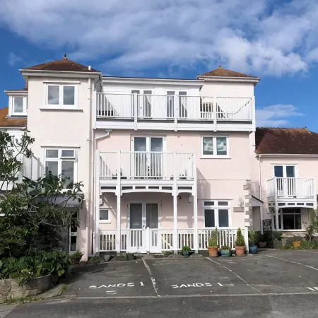 Seaside two bedroom flat with parking opposite path onto beach