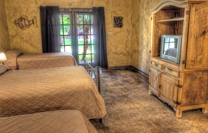 6-bedroom Lodge on 12 acres in Concan, Texas.  Swimming pool & hot tub.