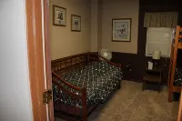 Sleeps 2-13 people, 2 bunkrooms, 2 bath, laundry, bar, kitchen-building Main St.