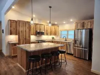 Spacious 5-BR home in Manitowish Waters with pier access on Chain of Lakes.