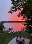 Relax in Raymond's lakefront 2-bedroom vacation home, just steps to Sebago Lake