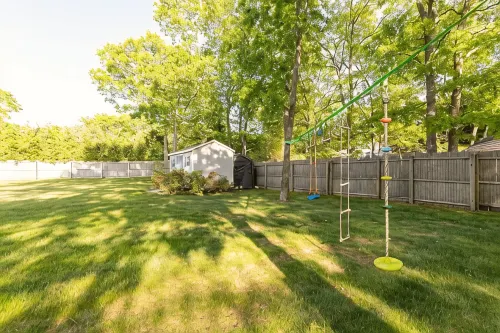 Chic Hamptons Home with Heated Gated Pool and Grill