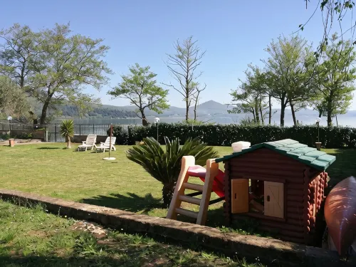 Independent villa with private beach on the lake