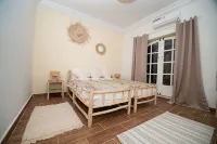 Villa Safran Ailleurs sous les Oliviers 15 minutes from the medina in Marrakech