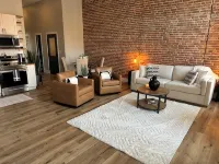 Stylish & Modern 2-Bdrm Apt in Downtown Warsaw featuring an urban rooftop deck.