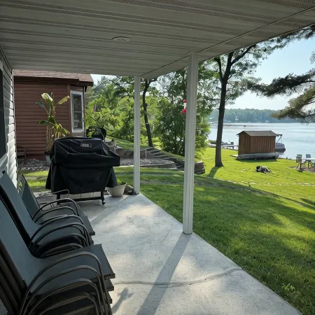 Big Pine Lakefront Retreat with Private Beach, Dock, Fire Pit & Sunset Views