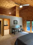 Cozy log cabin secluded in a mountain forest with hot tub, sauna, private patio. - Balcony