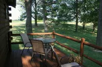 Rest, Relax and Renew. Our log cabin experience awaits your arrival. - 4-Star