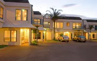 Pacific Harbour Motor Inn Hotels near Pouawa Beach