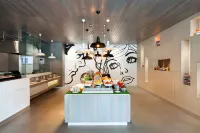 Hotel Neo Palma Palangkaraya by Aston - breakfast