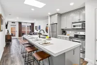 Top Floor Condo with Balcony Steps to Lifts & Main Street 2 Bedroom Condo by RedAwning