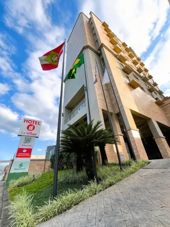 Le Village Flats e Hotel